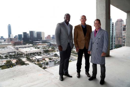 Photo By Karen Warren/Houston Chronicle Staff  Acho Azuike, left, Roberto Contreras and Randall Davis expect the Galleria-area luxury tower Astoria to be completed next year. Foreigners seeking green cards have played a major role in financing it. ( Karen Warren / Houston Chronicle ) 